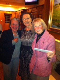 Lady Captain Liz & Kay collect a prize from President Marian (2016)