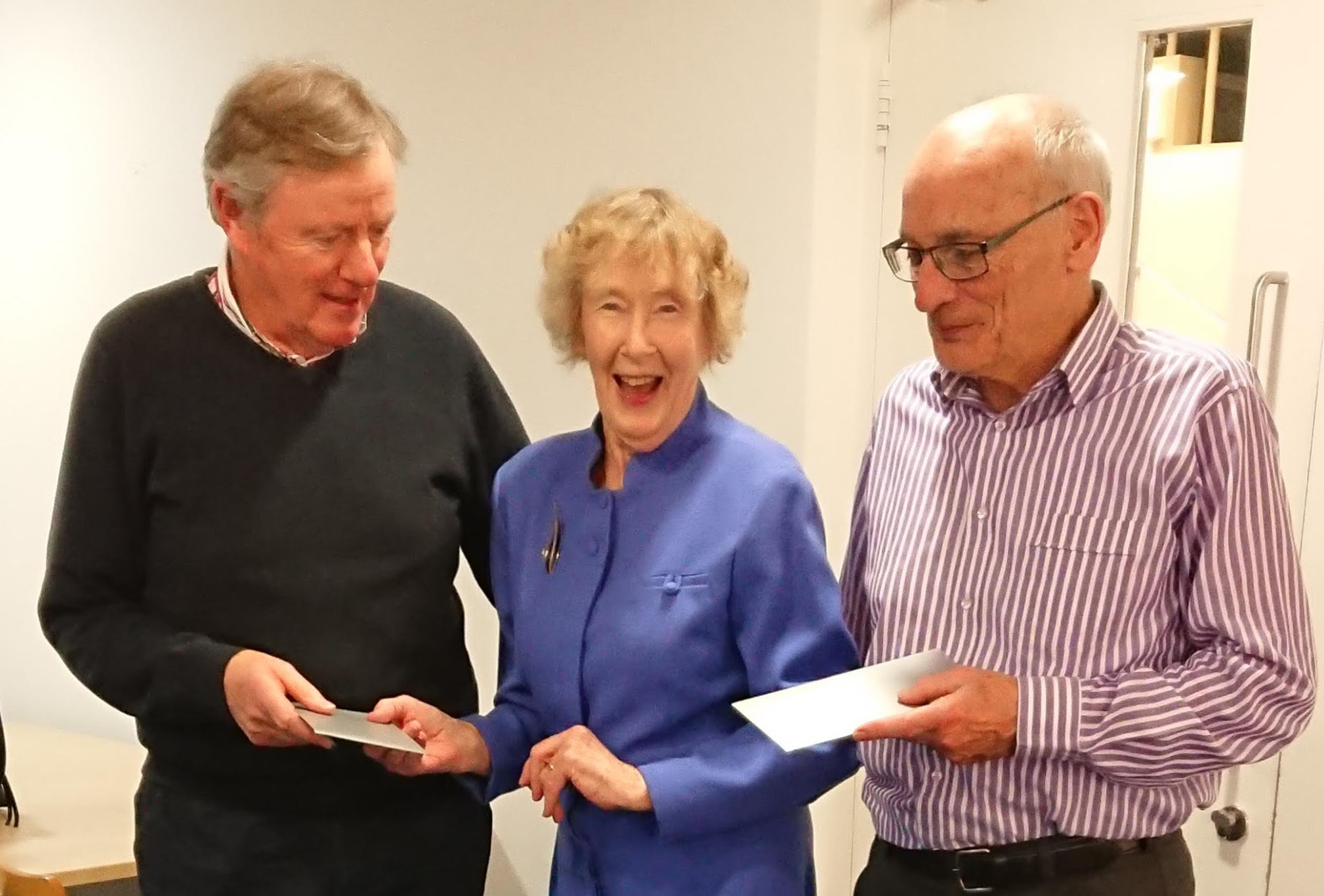 President Mirn Corbett presenting her prize to Chris Fitzgerald and Peter Lynch