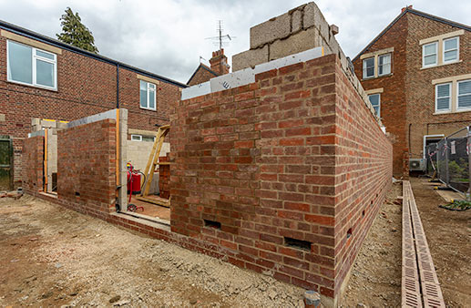 Extension walls nearing completion - 15 August