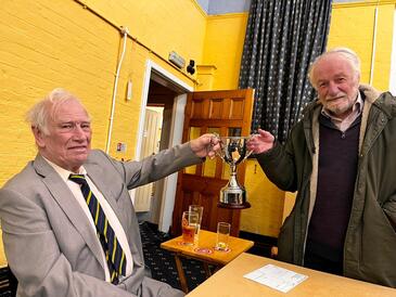 Tony Wakeling and Tom Morris receiving the Alan and Pat Smith Trophy 2025