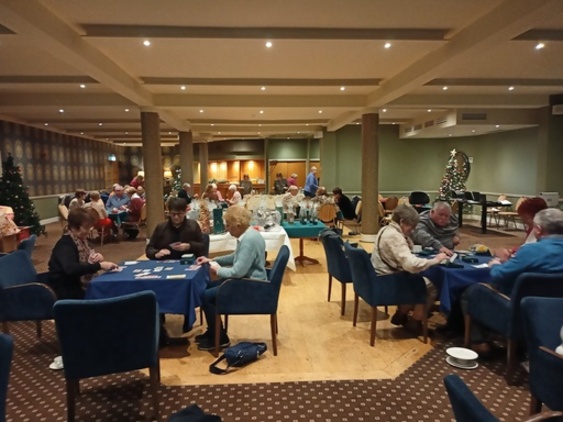 Enjoying our funraising game of Bridge December 2025