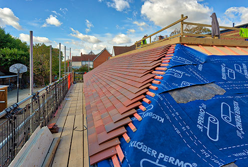 Extension roof tiling in progress - October 1