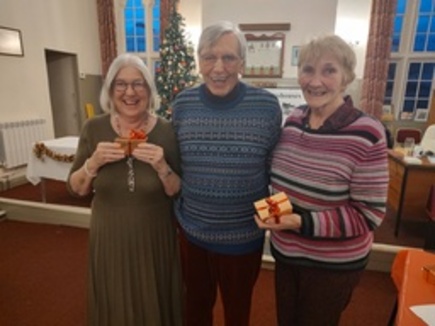 Mary and Judith Christmas 2025 North South competition winners with Peter Jaram our club Chairman