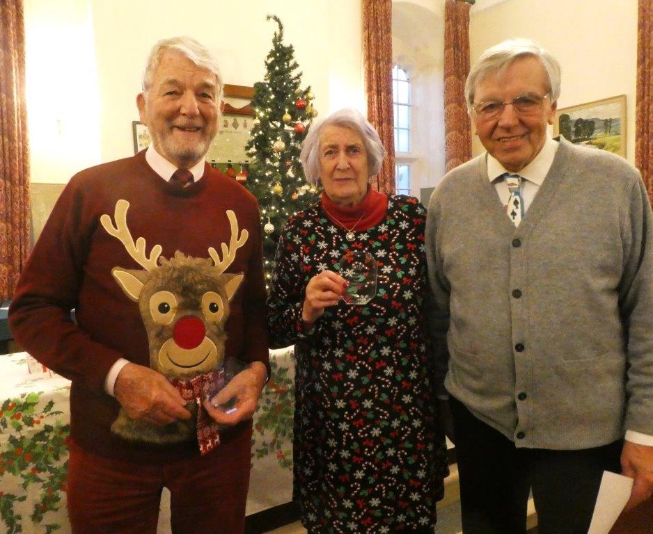 Tom and Sue who had the highest scoring game in 2023, with our director Peter
