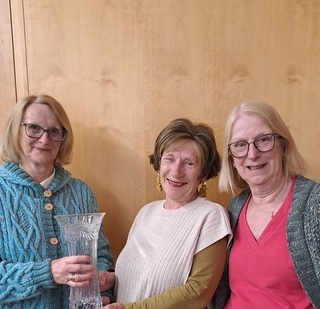 Ailish and Detta presenting our Club President Emer with the Rita Doggett Memorial Crystal Trophy in memory of their late mother.